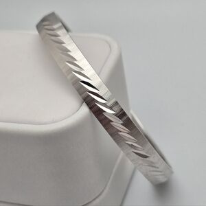 Monet Silver Tone Bangle Bracelet Classic Stackable Minimalist Engraved Design